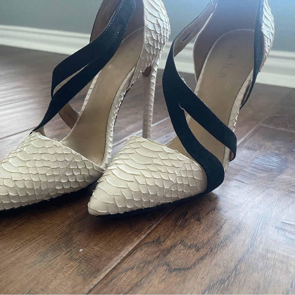 Gwen Stefani’s L.A.M.B. line. These heels are EUC because only wore them twice.